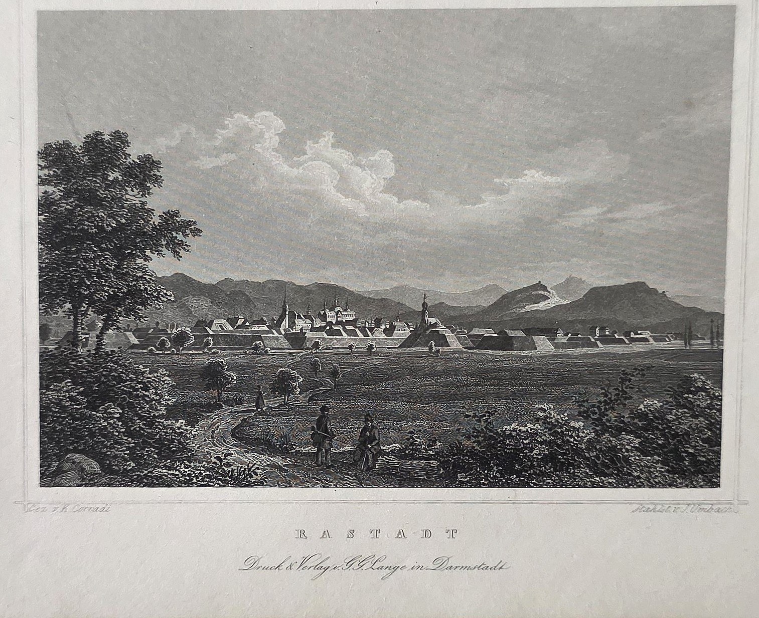 einer ländlichen Ortschaft vor Bergkette