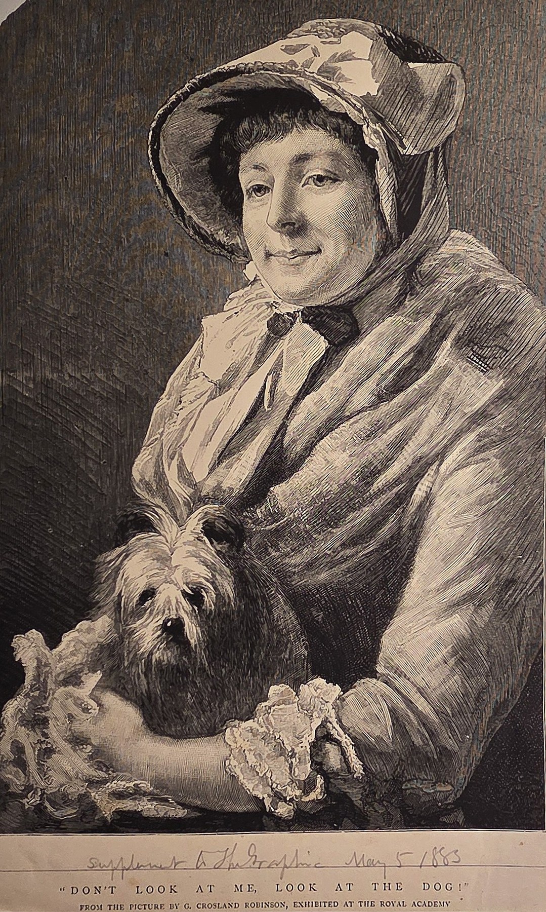 Dame mit kleinem Hund im Arm