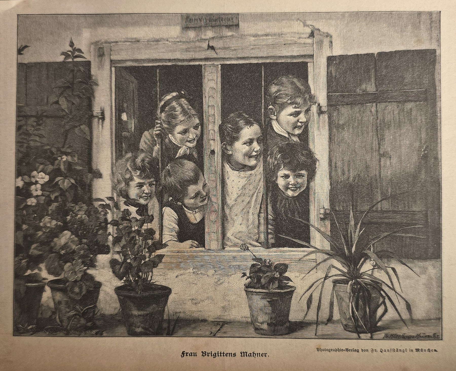 Kinder blicken aus einem Fenster