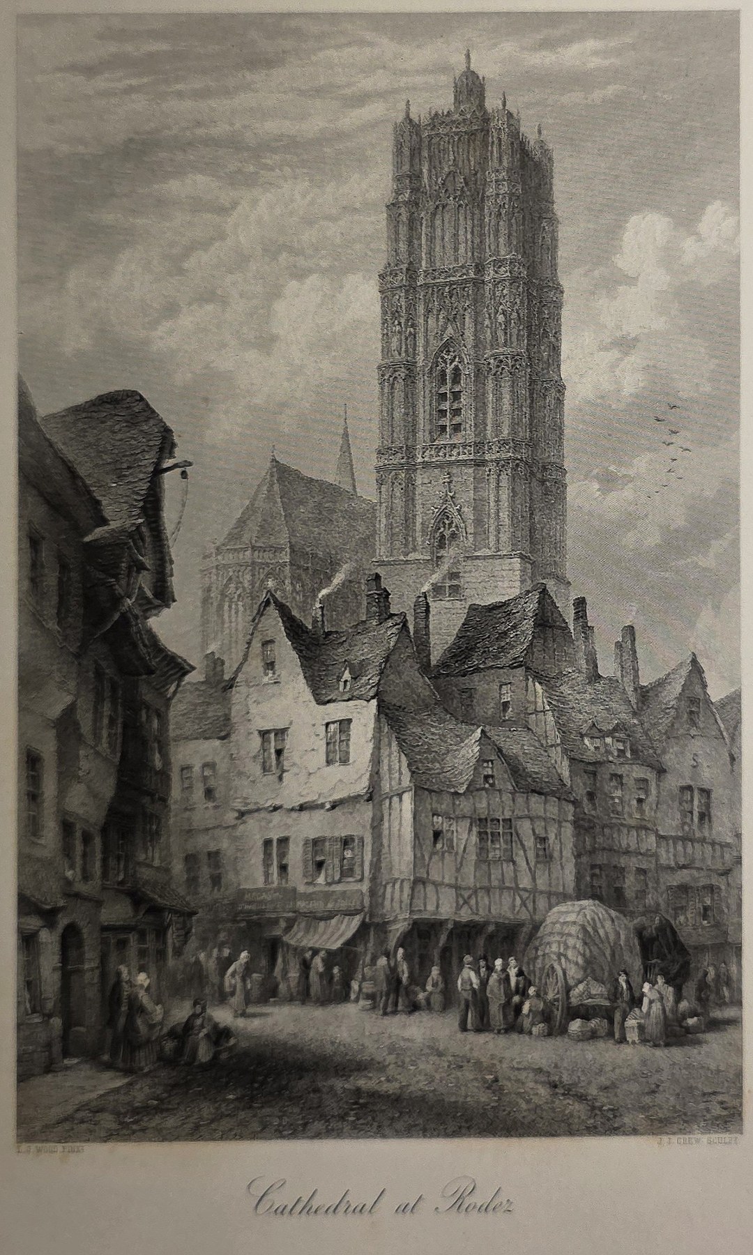 mit hoch aufragendem Turm über dicht bebauter Stadt