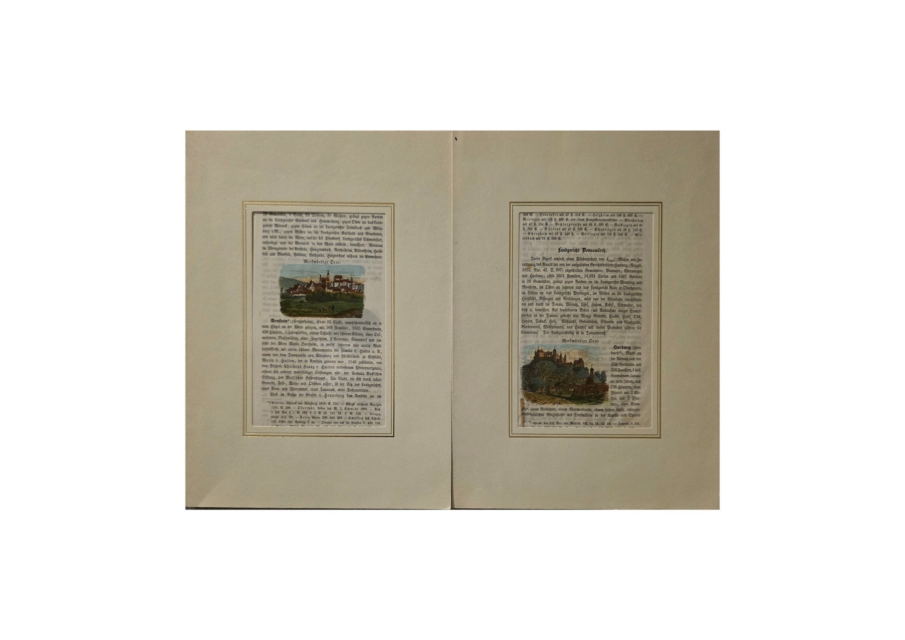 Historische Doppelseite mit Text und kleinen Stadtansichten