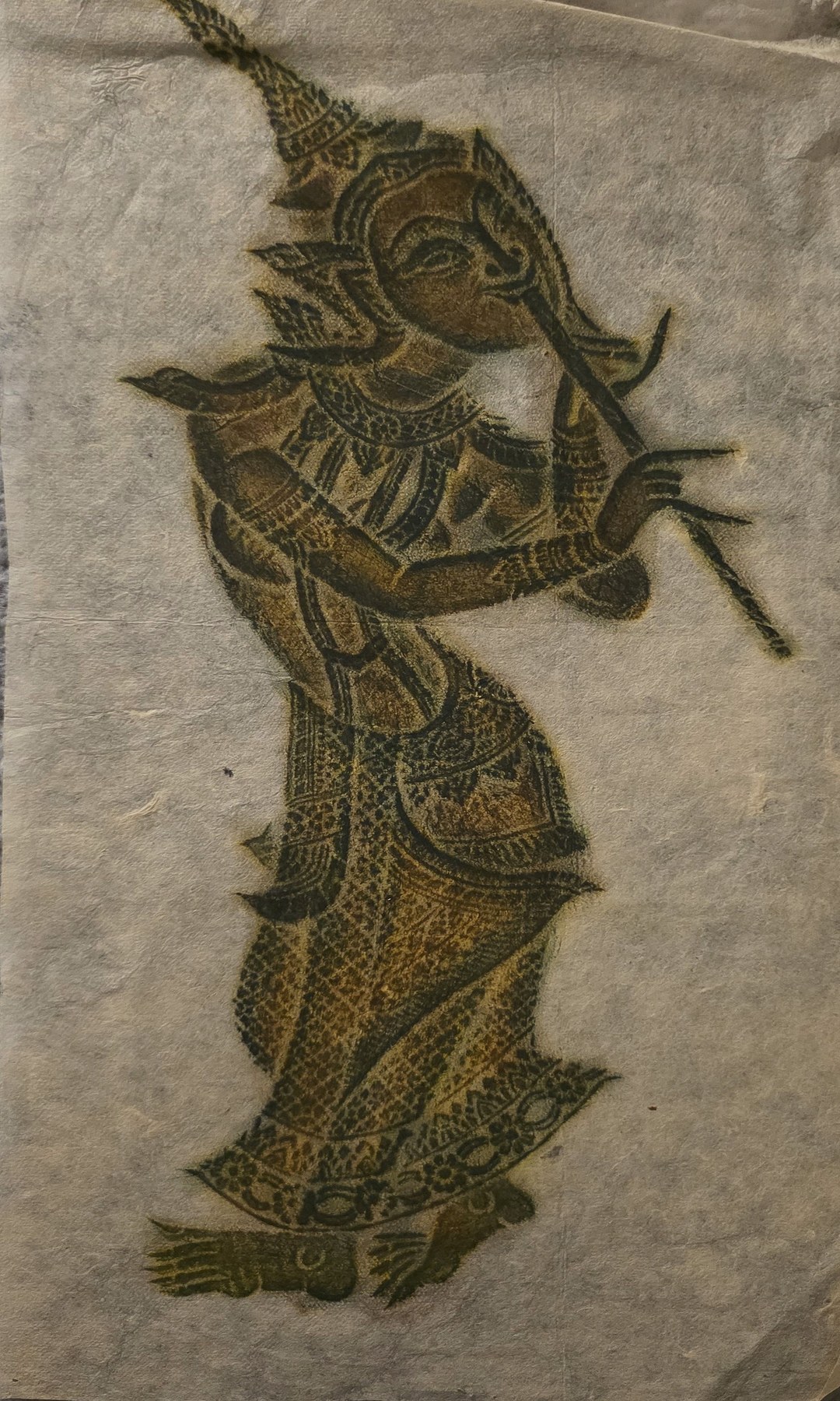 Asiatisch anmutende Figurengrafik mit spitzer Kopfbedeckung