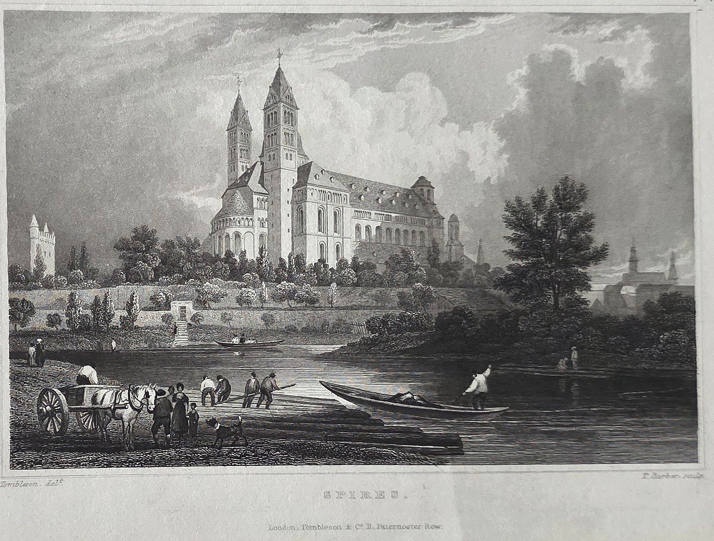 mit monumentaler Kirche am Flussufer