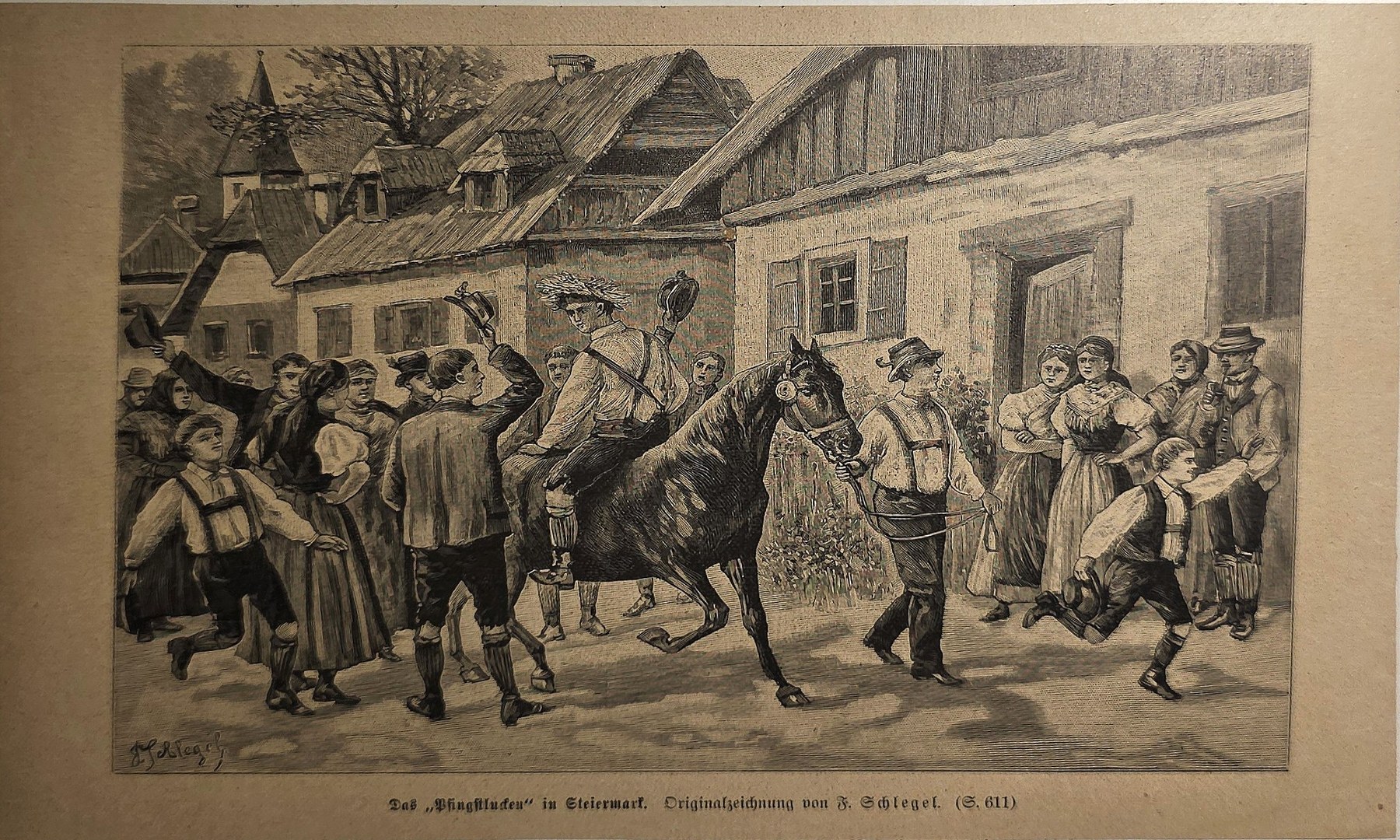 Festliche Dorfszene mit geschmücktem Rind