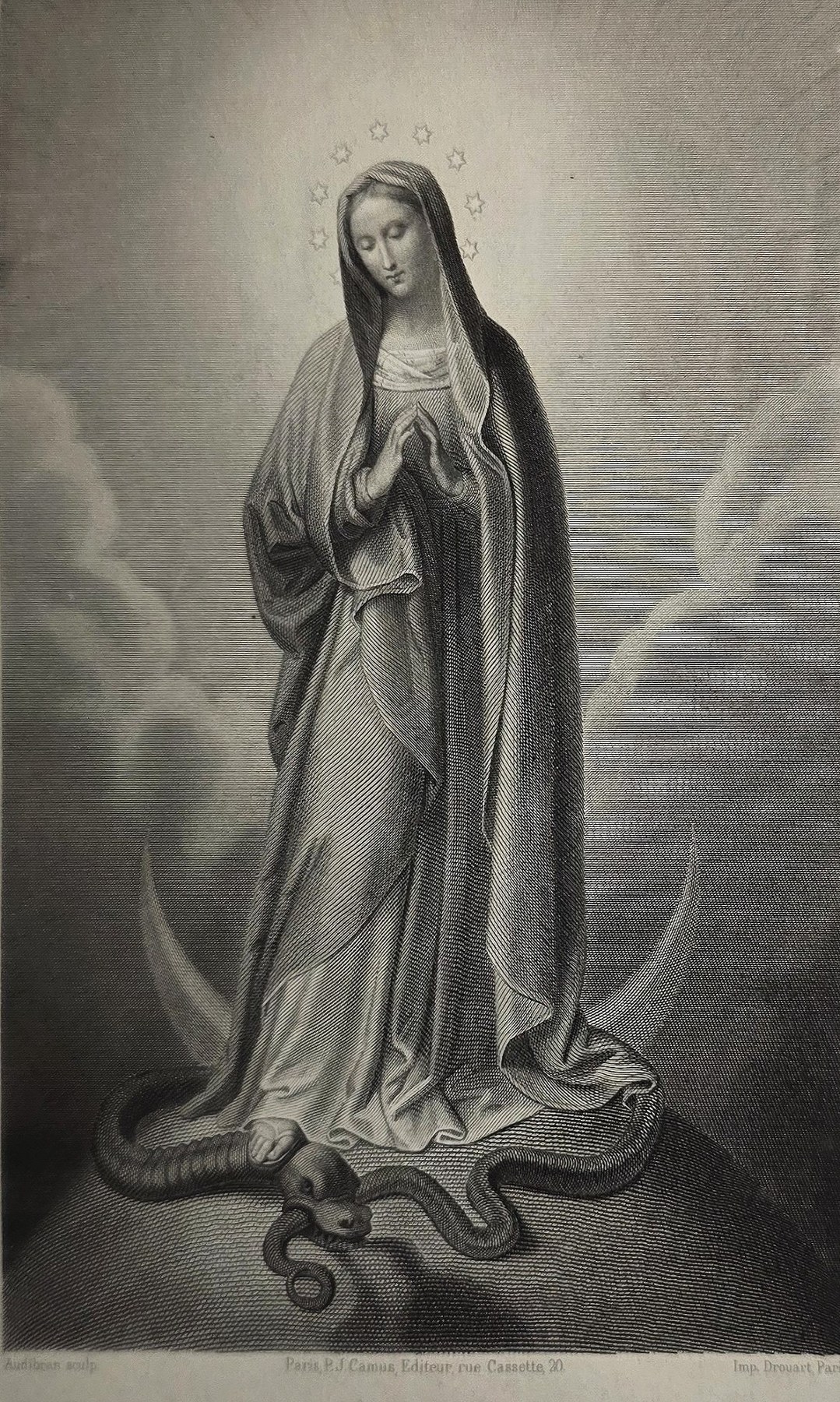 einer Madonnenfigur mit Sternenkranz und Mondsichel