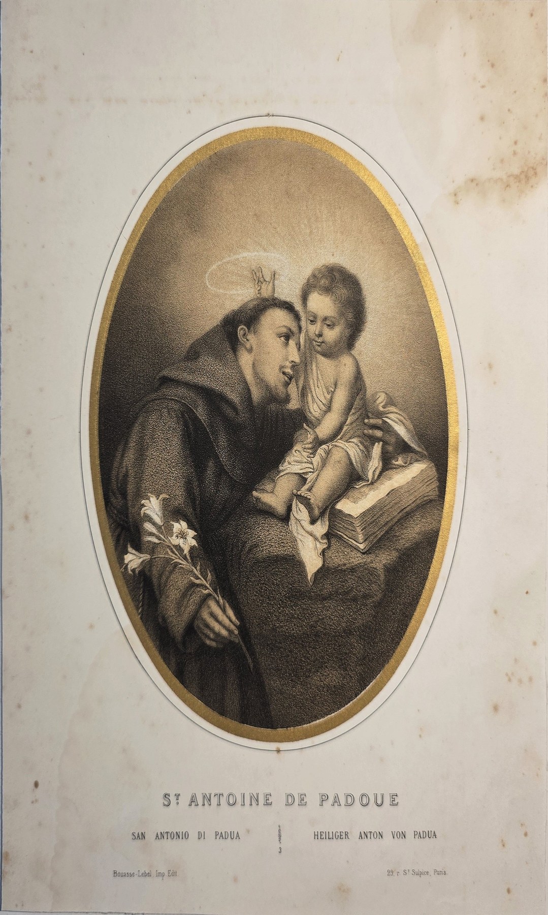 Ovale mit Ordensmann und Kind über Buch