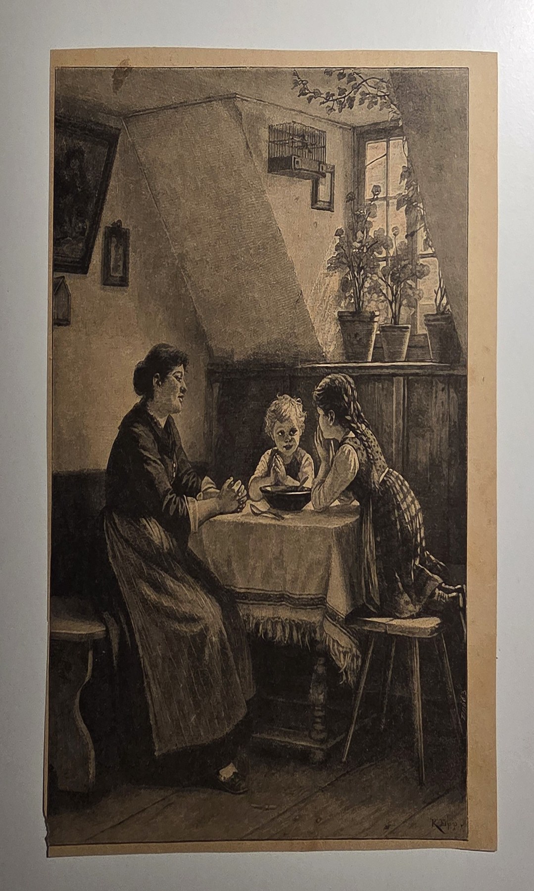 Zwei Frauen an kleinem Tisch in schlichter Stube