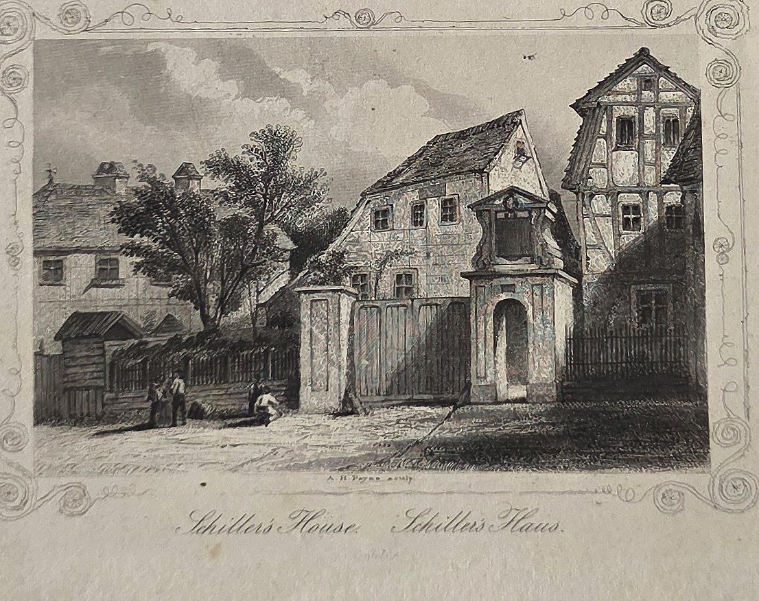 einer Fachwerkhäusergruppe mit Zierrahmen