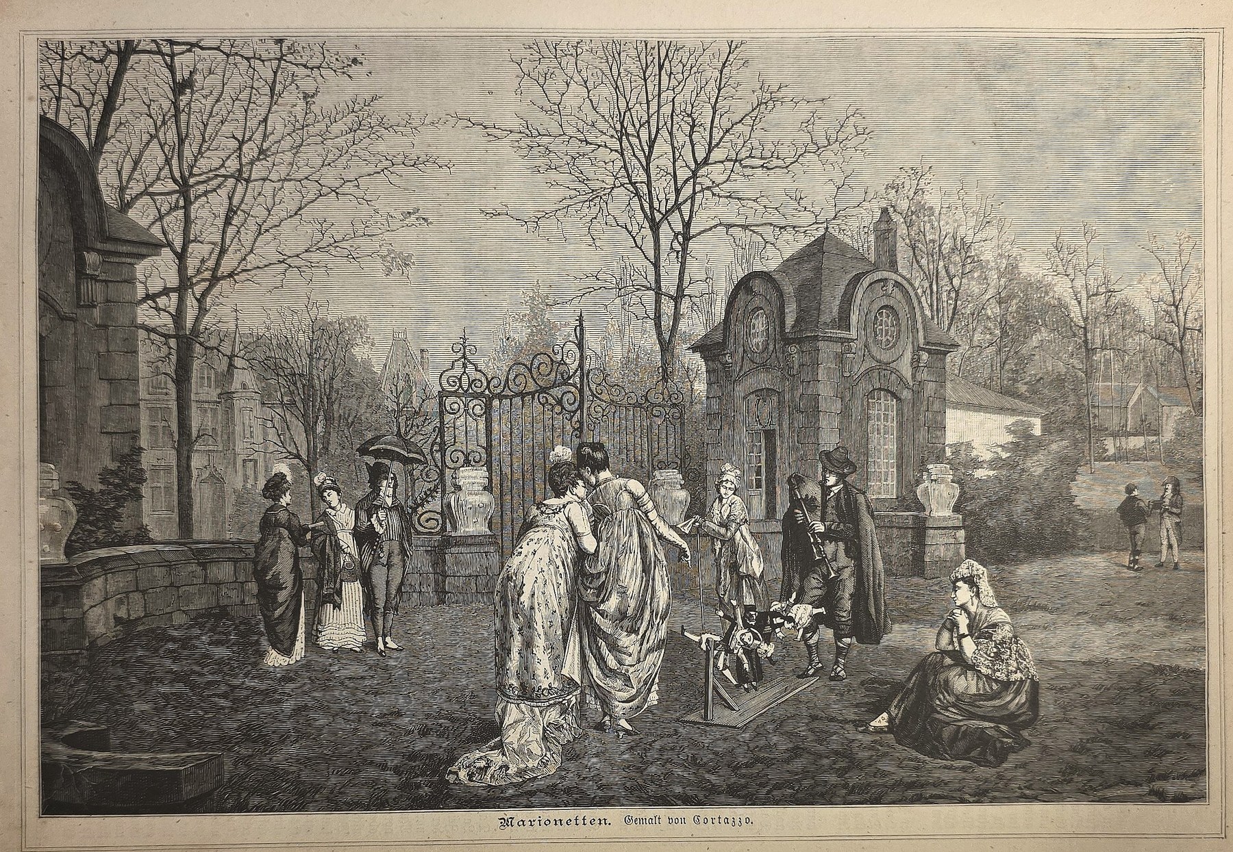 Figuren an einem Friedhofstor