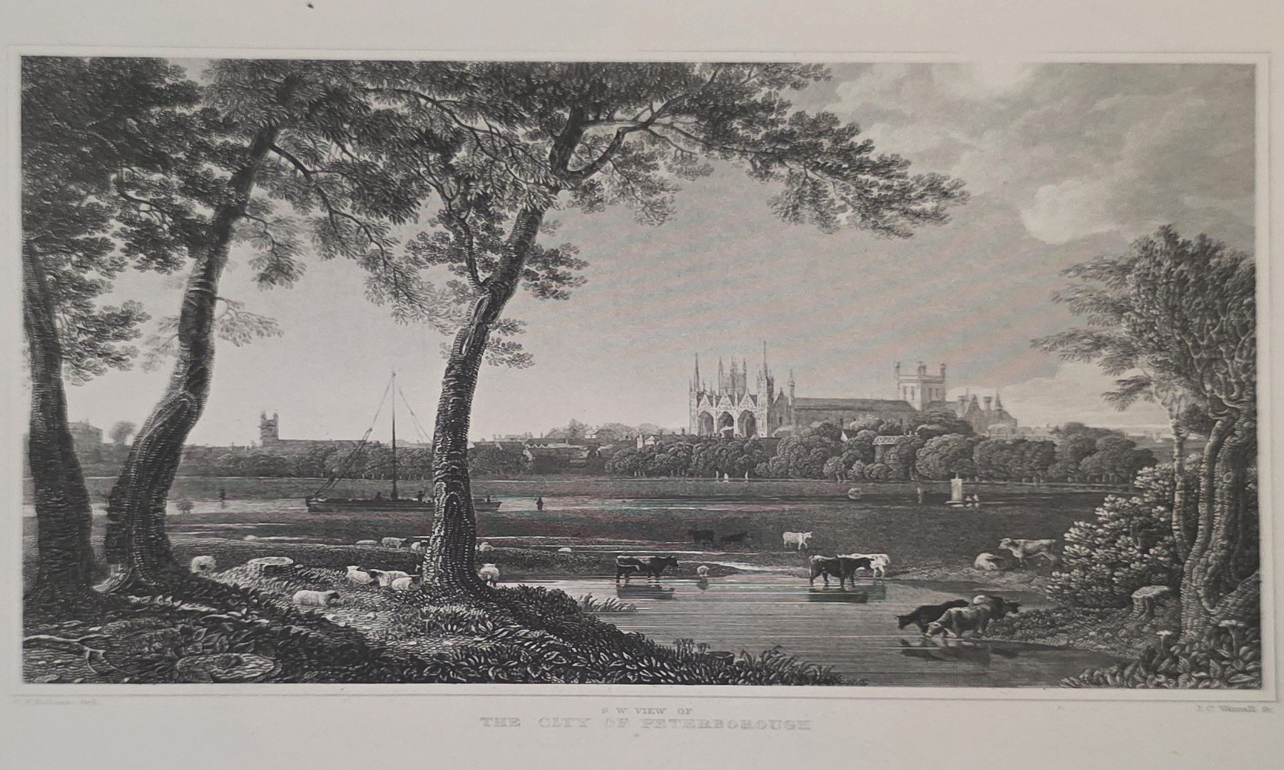 Weite Flusslandschaft mit Stadtblick