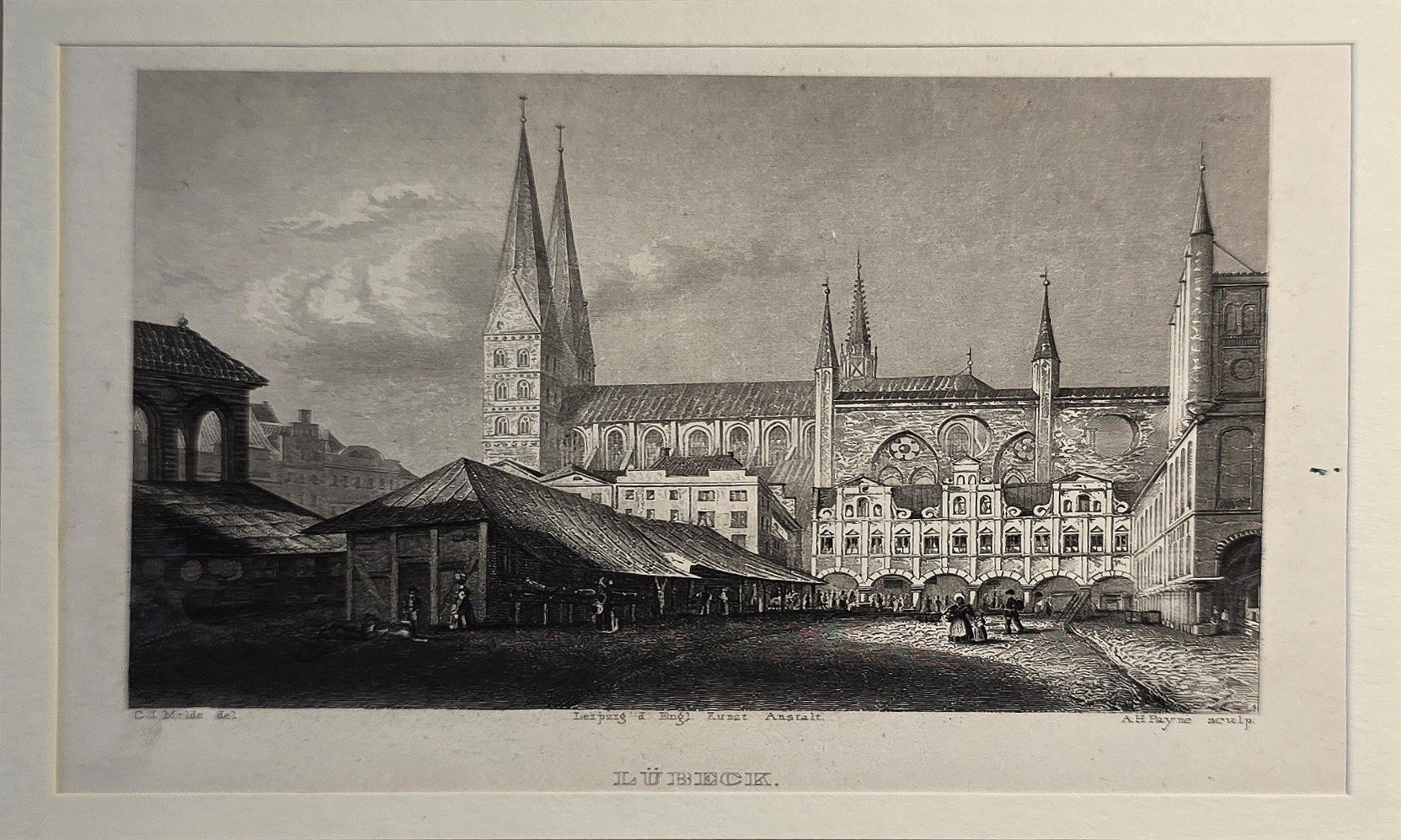 Kirchenanlage mit hohen Türmen und Kreuzgang